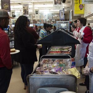 Volunteers serving food at St. Vincent de Paul in Phoenix